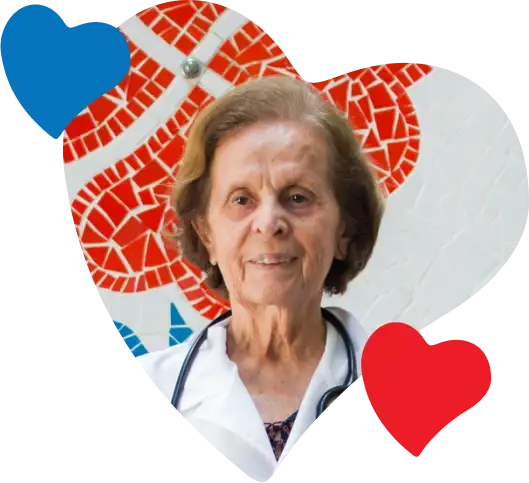 Doutora — imagem da campanha Dona Rosinha. Senhora vestida de médica (jaleco e estetoscópio) em recorte com corações coloridos ao fundo.