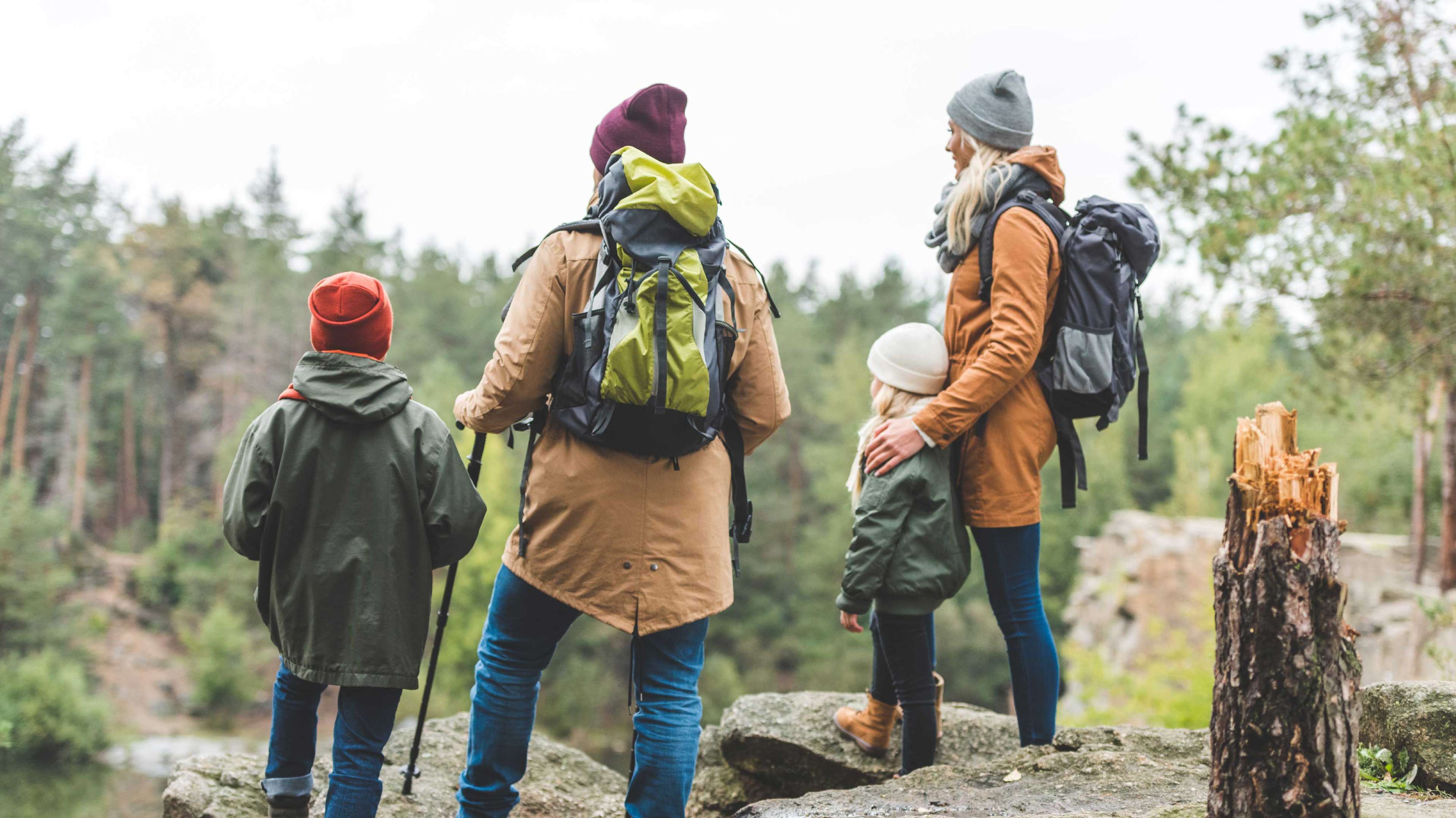 Man with a boy resting under a bike